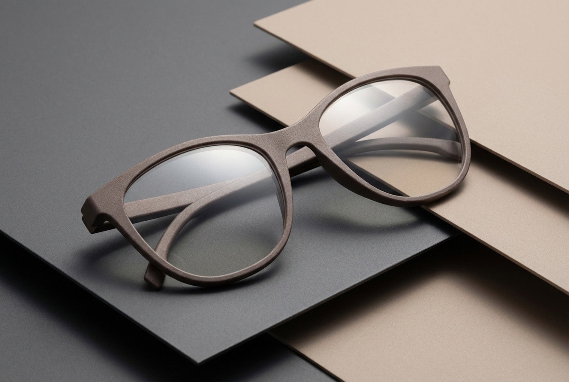 designer eyewear prototype displayed on studio boards illustrating contemporary optical frame design

