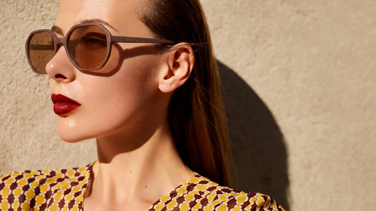 Model wearing 3D printed eyewear frame from a private label optical collection